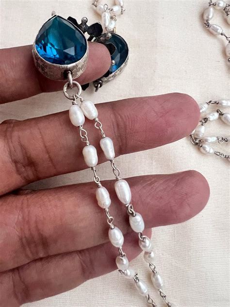 Silver side mope long pearls chain with blue glass stone| House of Taamara