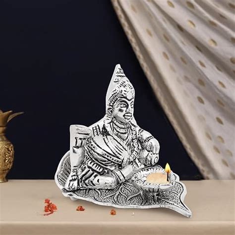 Buy INTERNATIONAL GIFT® Golden Metal Indian Maharaja Kuber with Leaf ...