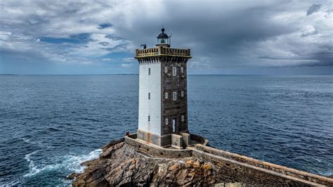 Wallpaper lighthouse, tower, sea, ocean, rock hd, picture, image