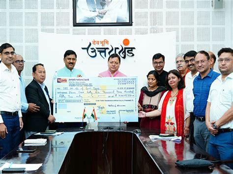 Pitkul hands cheque worth Rs 11 crore to CM Pushkar Singh Dhami