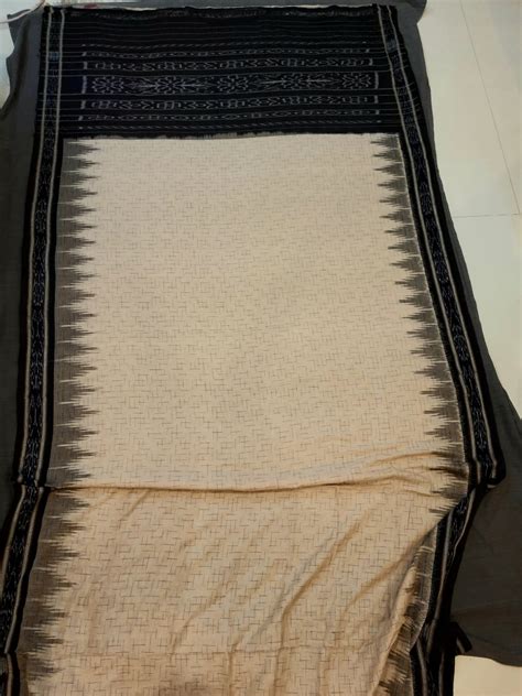 This garment has been woven, in the interiors of India, on a handloom ...