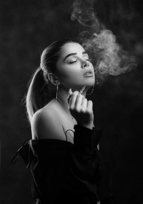 Black and White Photo of a Young Woman Smoking a Cigarette · Free Stock ...