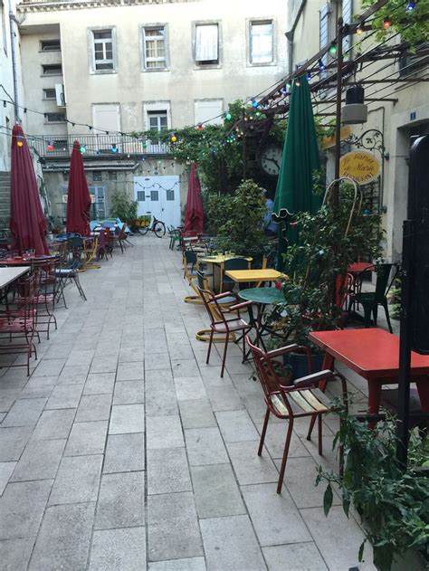 Cafe Marie in St. Remy de Provence | Street view, Views, Sidewalk