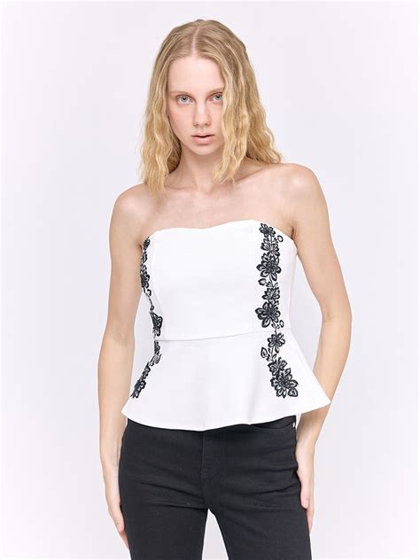 Rosetta Ivory bandeau peplum top