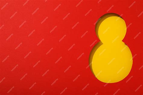 Premium Photo | Number eight cut out of paper on a red background