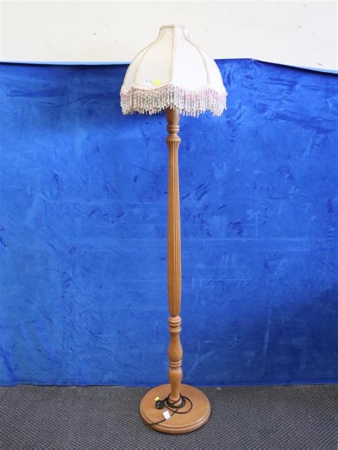 Lot - WOODEN FLOOR LAMP WITH BEADED TASSEL SHADE