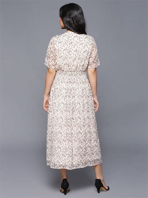 Shop latest Peach Elbow Sleeve Floral Print Dress – Hassu's