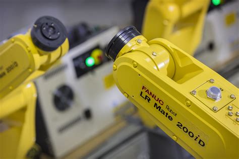 Image result for Automated Assembly Cell with Robot