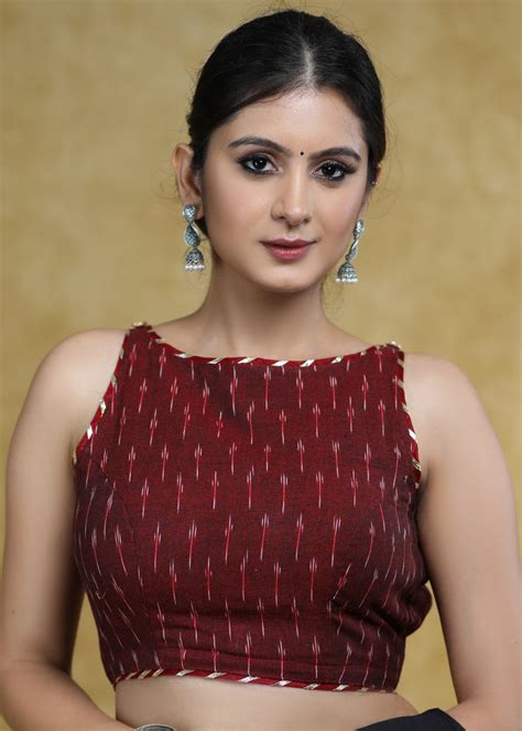 Elegant Maroon Ikaat Sleeveless Blouse with Golden Gota-Patti Detailin ...