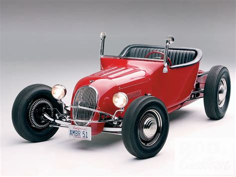 Behold the timeless elegance of the 1923 Ford Model T Roadster in captivating Matador Red