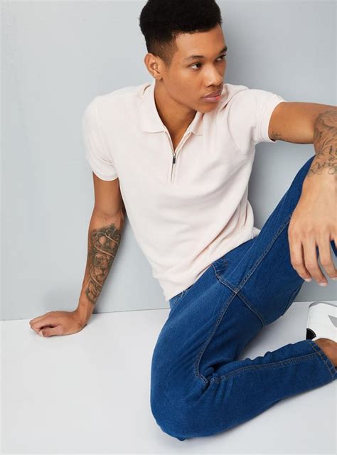 Buy Men Textured Zipper Polo T-shirt Online at just Rs. 699.0 ...