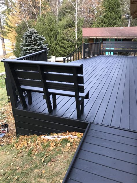 Black Deck Stain + Copper Solar Deck Caps - Dans le Lakehouse