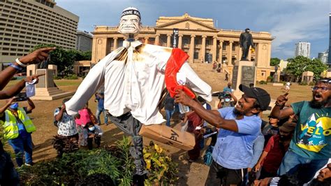 Chaos in Sri Lanka marks new PM's swearing-in, forces clash with protesters