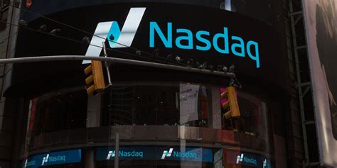 Nasdaq closes above 6,000, setting new record