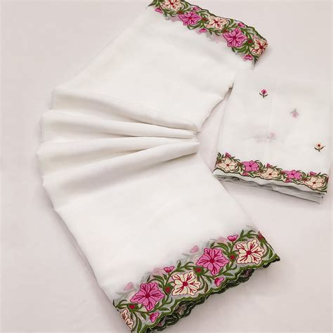 White Faux Georgette Saree Featuring Minimalist Floral Border Embroide