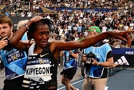 Image result for Kipyegon breaks 5,000m world record