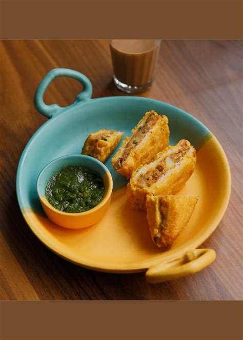 Get Kadhai Shaped Yellow Blue Shaded Serving Platter With Fixed Chutney ...