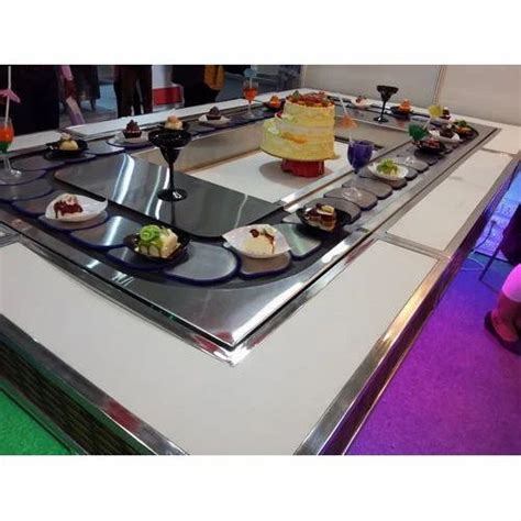 Conveyor System - Rampwalker Dessert Conveyor Manufacturer from Greater ...
