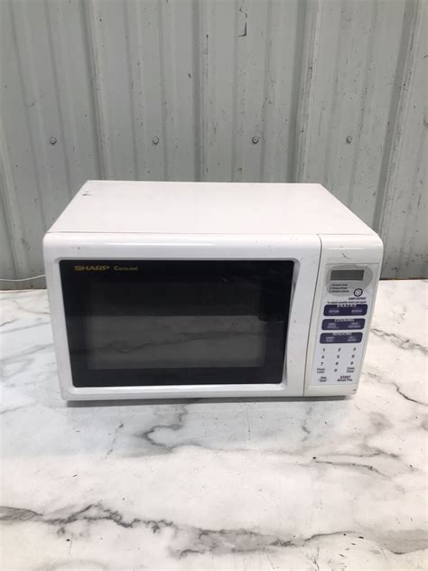 Image result for How to Set Time On Sharp Carousel Microwave