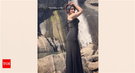 Photo: Bhojpuri actress Poonam Dubey’s stunning pose near the waterfall ...
