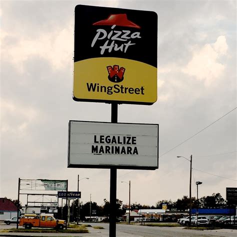Did a double-take at Pizza Hut sign this morning : r/pics