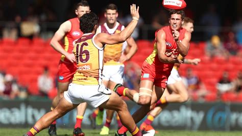 Gold Coast's David Swallow says AFL shouldn't force players to have flu ...