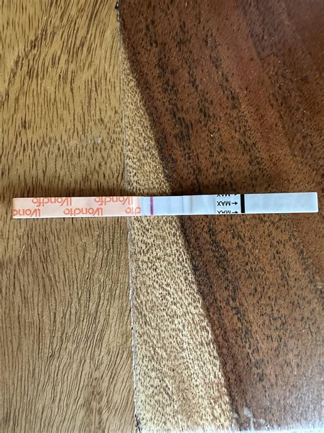 1st pregnancy test - 11 days DPO - is this a positive?! : r/TFABLinePorn