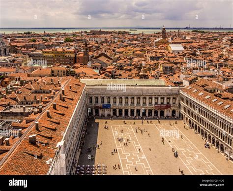 Aerial view of St Mark's square, with it outdoor cafes. Venice, Italy ...
