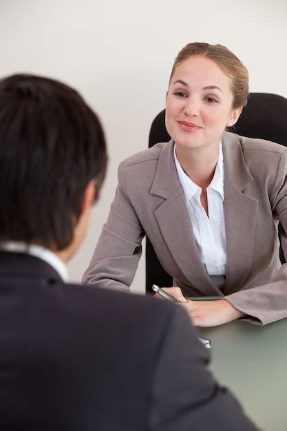 Portrait of a manager interviewing a male applicant | Premium Photo