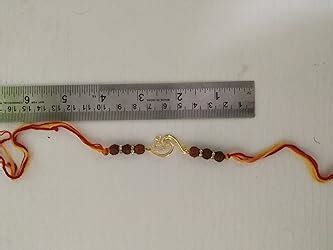 Mahi Brown & White Gold Plated Rakshabandhan OM Rakhi with Rudraksh for ...