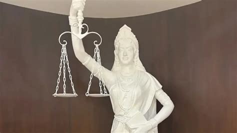 Lady Justice in SC library now holds a Constitution with open eyes
