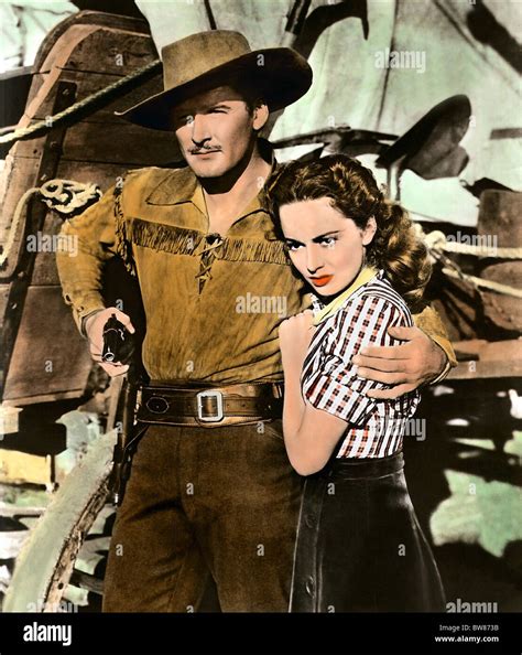 ERROL FLYNN, OLIVIA DE HAVILLAND, DODGE CITY, 1939 Stock Photo - Alamy