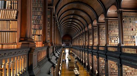 https://rare-gallery.com/uploads/posts/1158878-architecture-building-books-symmetry-library-Dublin-shelves-arcade-cathedral-Trinity-College-Library-place-of-worship-aisle.jpg