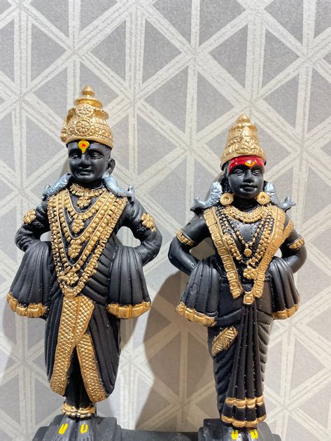 Competently handcrafted black and golden god Vitthal Rukmini idol ...