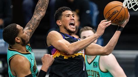 Devin Booker sizzles as Phoenix Suns survive late flurry from Charlotte ...