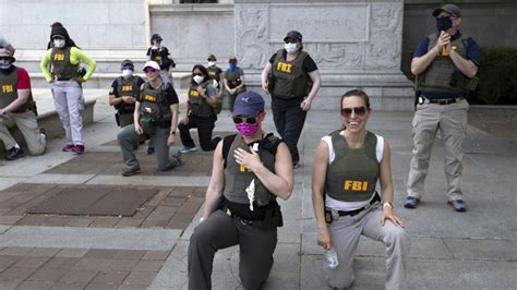 Why FBI Fired Agents Photographed Kneeling During 2020 George Floyd ...