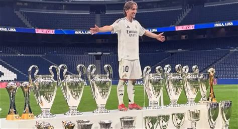 ICONIC: Luka Modric poses with all 28 trophies he's won at Real Madrid ...