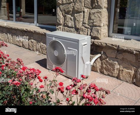 Outdoor heat pump unit hi-res stock photography and images - Alamy