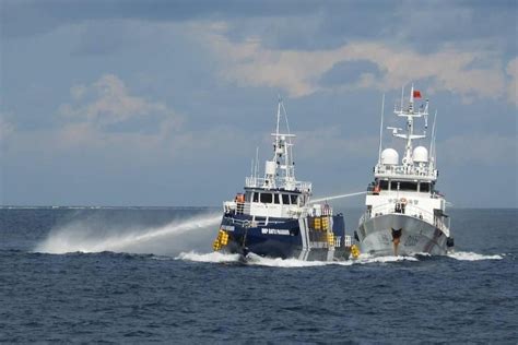 Chinese coast guard rams and damages a Philippine vessel off an island in the South China Sea ...