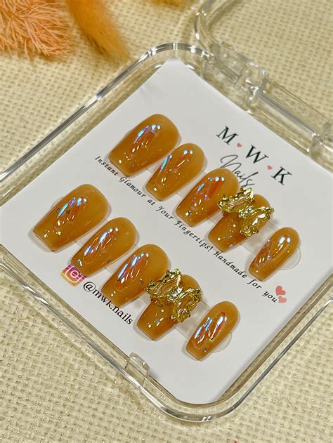 Tawny Wings – csessentials.in