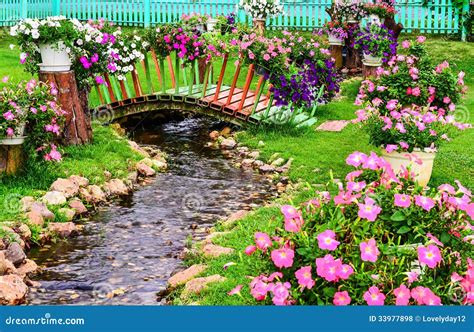 Spring Flowers In Garden With A Pond Royalty Free Stock Photos - Image ...