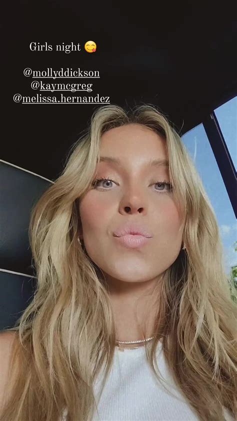 Sydney Sweeney poses topless under an XL blazer in latest shoot