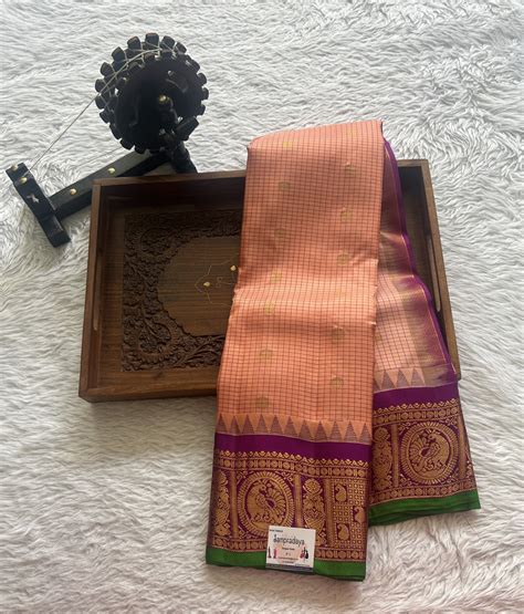 Gadwal Pattu Saree Peach colored with a Zari border – Sampradaya ...