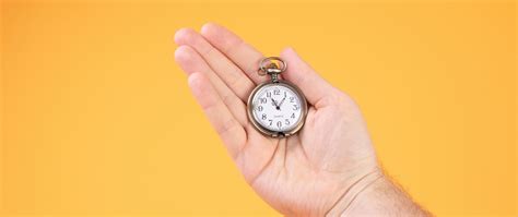 Download wallpaper 2560x1080 hand, watch, time, yellow dual wide 1080p ...