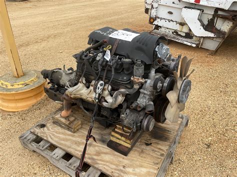 CHEVROLET 6.0 LITER ENGINE W/ TRANSMISSION - J.M. Wood Auction Company, Inc.