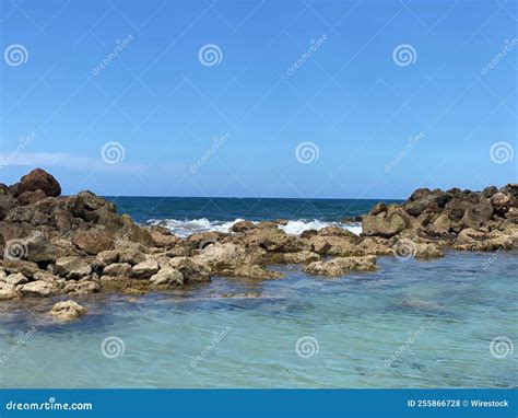 Scenic View of Rocks Along Blue Seashore, St Ann Bay, Jamaica Stock ...