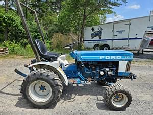 Image result for Ford 1210 Compact Tractor