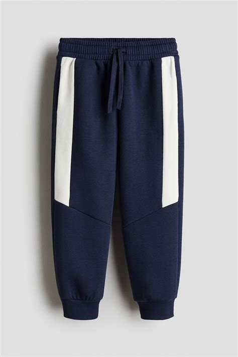 Colour-blocked joggers - Navy blue/White - Kids | H&M IN