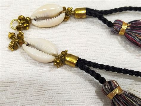 Image result for How to Design a Bag Using Cowrie Shells