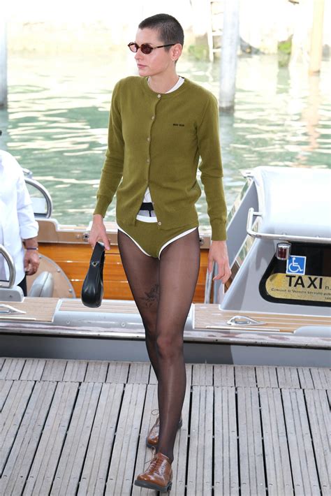 Emma Corrin goes pantsless at 2023 Venice Film Festival
